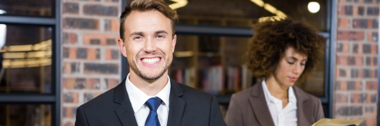 Young professional in suit smiling