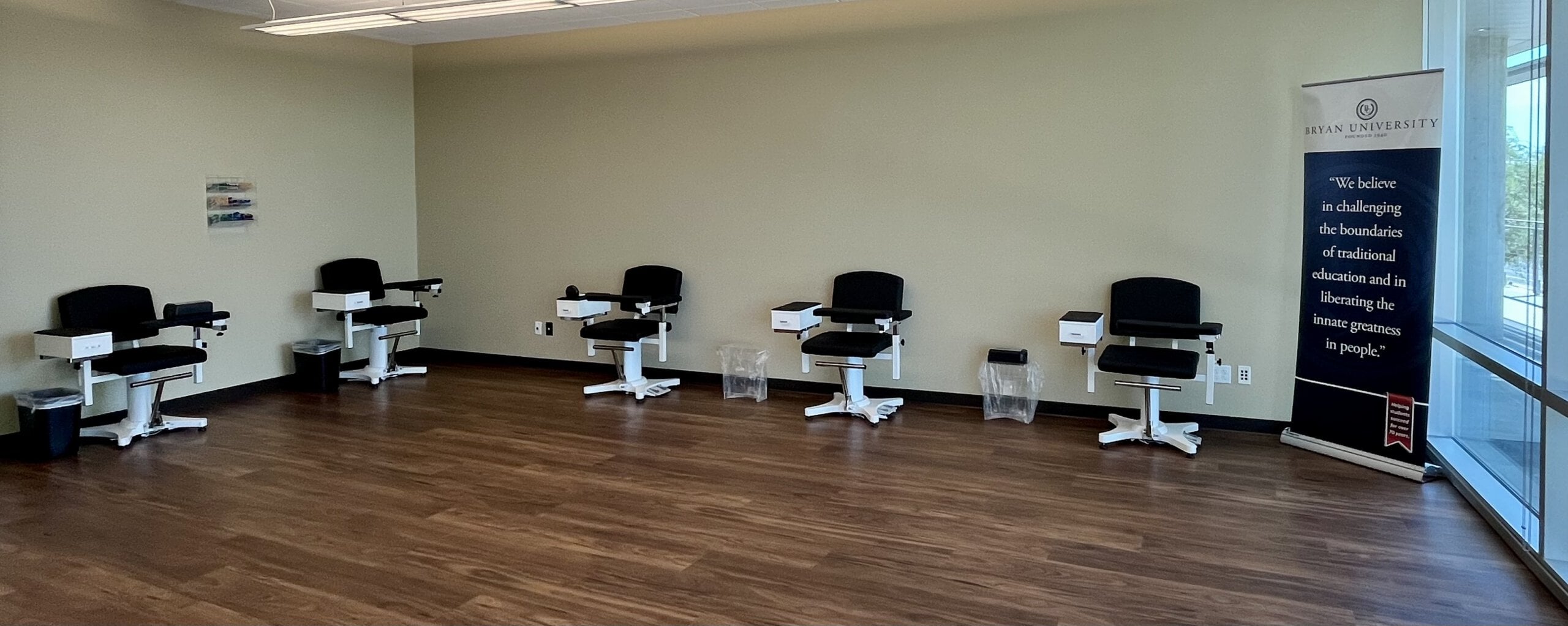 Interior of PHL Lab 2 showing a row of workstations.