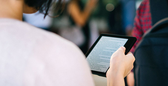 woman looking at ebook